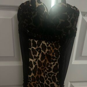 Rampage lingerie cheetah print around a 34 B cup size with lace and a black bow
